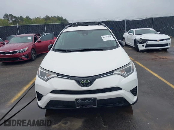 2017 Toyota RAV4 LE with VIN JTMZFREV9HJ704296, listed as a IAAI auction lot 41876996 with 85,605 mi miles and . Bid and sale history available at DreamBid. Image 12.