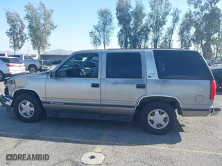 1999 Chevrolet Tahoe with VIN 1GNEC13R8XJ527499, listed as a IAAI auction lot 41880157 with 186,342 mi miles. Bid and sale history available at carsss.com. Image 14.