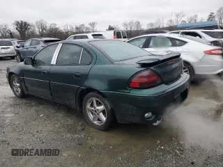 2001 Pontiac Grand Am GT with VIN 1G2NW52E81C266753, listed as a Copart auction lot 45086335 with 181,742 mi miles and Salvage Title. Bid and sale history available at carsss.com. Image 2.