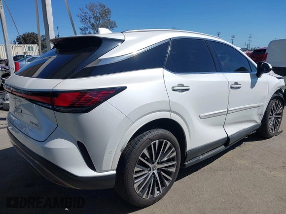2024 Lexus RX with VIN 2T2BAMBA3RC022849, listed as a IAAI auction lot 41819024 with 8,936 mi miles. Bid and sale history available at carsss.com. Image 4.