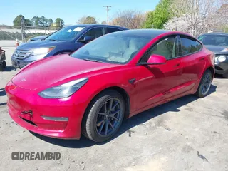 2022 Tesla Model 3 Long Range with VIN 5YJ3E1EB1NF272452, listed as a IAAI auction lot 41897358 with 78,458 mi miles and . Bid and sale history available at DreamBid. Image 2.