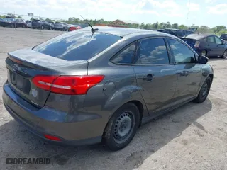 2016 Ford Focus S with VIN 1FADP3E26GL397348, listed as a IAAI auction lot 41952355 with 187,263 mi miles. Bid and sale history available at carsss.com. Image 4.