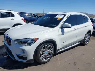 2017 BMW X1 xDrive28i with VIN WBXHT3C30H5F68187, listed as a IAAI auction lot 41830892 with 101,313 mi miles. Bid and sale history available at carsss.com. Image 17.