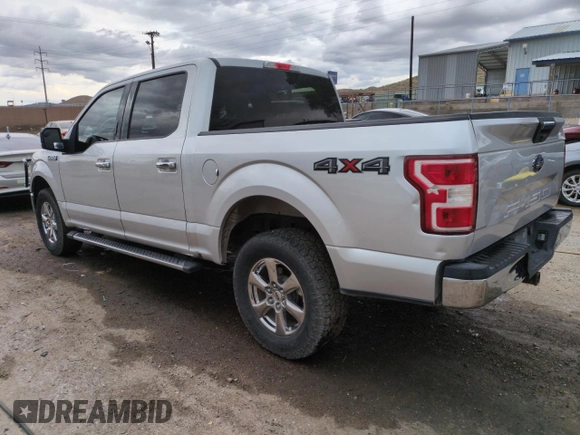 2018 Ford F-150 XL with VIN 1FTEW1E57JKC62666, listed as a Copart auction lot 61619235 with 149,759 mi miles and Clean title. Bid and sale history available at DreamBid. Image 2.