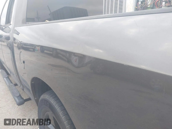 2014 Ram 1500 Tradesman with VIN 1C6RR6FG1ES332987, listed as a IAAI auction lot 41552524 with 217,684 mi miles and . Bid and sale history available at DreamBid. Image 6.