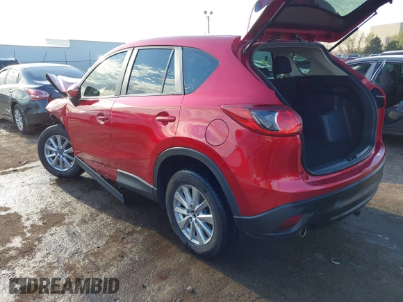 2015 Mazda CX-5 Sport z VIN JM3KE2BE7F0516869, wystawiony jako IAAI lot #41866488 z przebiegiem 131 237 mil mil oraz . Historia ofert i sprzedaży dostępna na DreamBid. Obrazek 3.