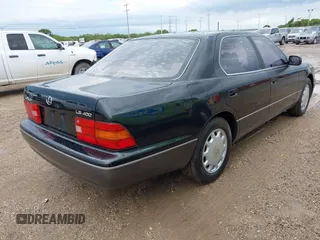 1995 Lexus LS 400 z VIN JT8UF22E4S0012626, wystawiony jako IAAI lot #42487777 z przebiegiem 215 469 mil mil oraz . Historia ofert i sprzedaży dostępna na DreamBid. Obrazek 4.