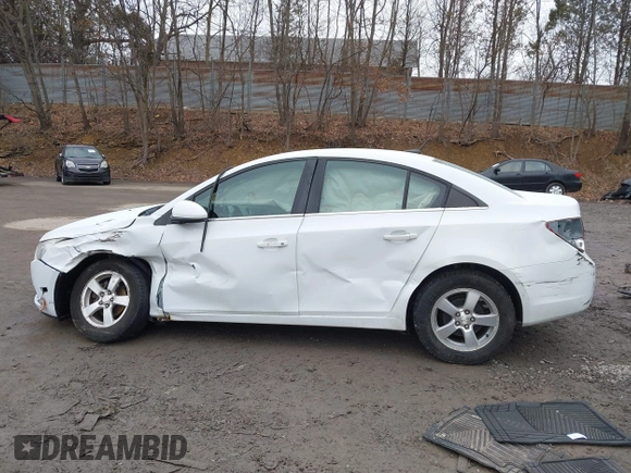 2014 Chevrolet Cruze 1LT z VIN 1G1PC5SB1E7264742, wystawiony jako IAAI lot #41740704 z przebiegiem 155 005 mil mil oraz . Historia ofert i sprzedaży dostępna na DreamBid. Obrazek 15.