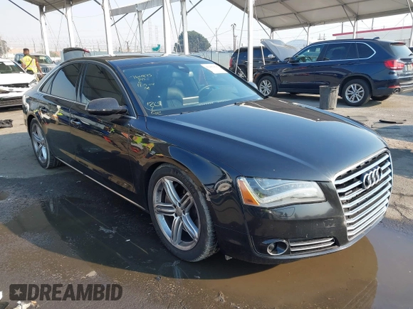 2011 Audi A8 with VIN WAUAVAFD6BN023937, listed as a IAAI auction lot 41288464 with 158,127 mi miles and . Bid and sale history available at DreamBid. Image 1.