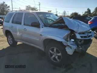 2006 Mazda Tribute S with VIN 4F2YZ04166KM17017, listed as a Copart auction lot 42969365 with 217,984 mi miles and Salvage Title. Bid and sale history available at DreamBid. Image 4.