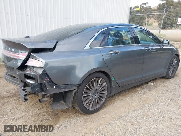 2016 Lincoln MKZ with VIN 3LN6L2G99GR609353, listed as a IAAI auction lot 42106982 with 161,046 mi miles and . Bid and sale history available at DreamBid. Image 4.