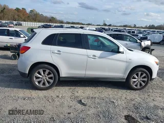 2015 Mitsubishi Outlander ES z VIN 4A4AP3AU4FE034451, wystawiony jako IAAI lot #41057102 z przebiegiem 166 263 mil mil oraz . Historia ofert i sprzedaży dostępna na DreamBid. Obrazek 13.