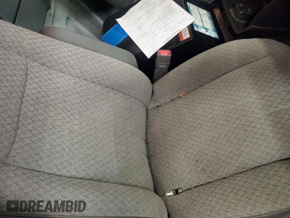 2015 Chevrolet Express Cargo Van with VIN 1GCWGFCFXF1159054, listed as a IAAI auction lot 42195601 with 163,315 mi miles. Bid and sale history available at carsss.com. Image 1.