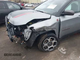 2022 Jeep Compass Trailhawk with VIN 3C4NJDDB3NT128118, listed as a IAAI auction lot 41664845 with 32,660 mi miles and . Bid and sale history available at DreamBid. Image 6.