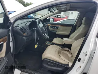 2020 Honda CR-V Touring z VIN 2HKRW2H90LH645727, wystawiony jako Copart lot #62077365 z przebiegiem 58 614 mil mil oraz Szkoda całkowita • Salvage title. Historia ofert i sprzedaży dostępna na DreamBid. Obrazek 7.