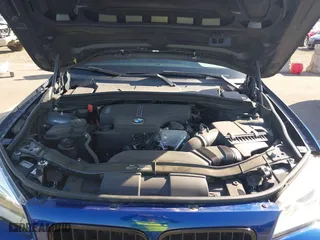 2015 BMW X1 xDrive28i with VIN WBAVL1C56FVY32753, listed as a IAAI auction lot 41759454 with 130,823 mi miles. Bid and sale history available at carsss.com. Image 10.