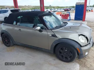 2010 MINI Convertible with VIN WMWMR3C52ATU97825, listed as a IAAI auction lot 42349417 with 64,045 mi miles and . Bid and sale history available at DreamBid. Image 13.