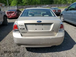 2006 Ford Fusion S with VIN 3FAFP06Z56R229610, listed as a Copart auction lot 55440745 with 125,699 mi miles and Salvage Title. Bid and sale history available at DreamBid. Image 6.
