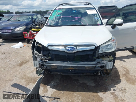 2015 Subaru Forester Touring with VIN JF2SJAWC0FH806493, listed as a IAAI auction lot 42355867 with 128,937 mi miles and . Bid and sale history available at DreamBid. Image 6.
