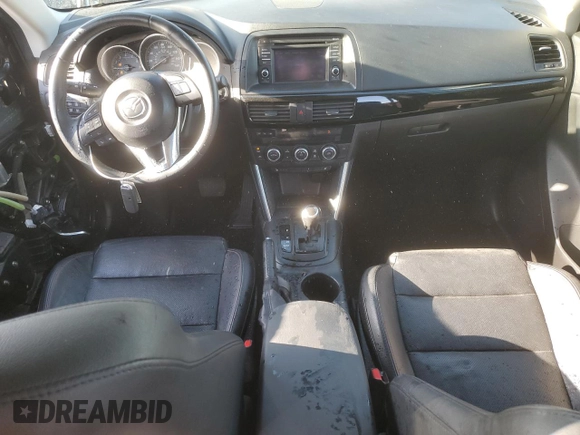 2014 Mazda CX-5 Grand Touring with VIN JM3KE4DY1E0328852, listed as a Copart auction lot 53965265 with 67,242 mi miles and Salvage Title. Bid and sale history available at DreamBid. Image 8.
