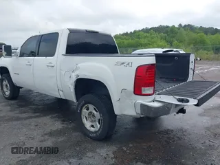 2010 GMC Sierra 1500 SLT z VIN 3GTRKWE37AG184132, wystawiony jako IAAI lot #42106936 z przebiegiem 243 711 mil mil oraz . Historia ofert i sprzedaży dostępna na DreamBid. Obrazek 3.