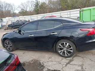 2018 Nissan Maxima SV with VIN 1N4AA6AP9JC383989, listed as a IAAI auction lot 41408474 with 195,135 mi miles and . Bid and sale history available at DreamBid. Image 14.