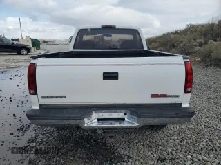 1995 GMC Sierra 1500 with VIN 1GTEK14K0SZ563517, listed as a Copart auction lot 50977315 with 280,549 mi miles and Salvage Title. Bid and sale history available at DreamBid. Image 6.