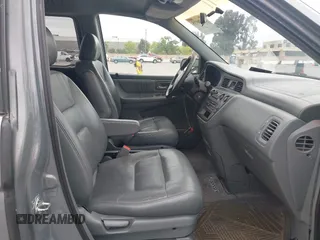 2002 Honda Odyssey EX-L z VIN 2HKRL18922H542116, wystawiony jako IAAI lot #42130335 z przebiegiem 205 053 mil mil oraz . Historia ofert i sprzedaży dostępna na DreamBid. Obrazek 5.
