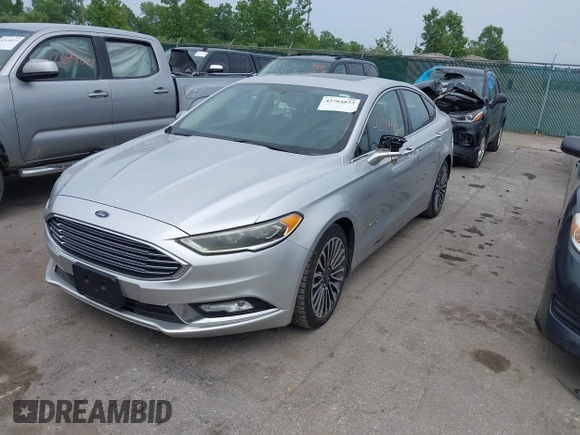 2017 Ford Fusion Hybrid Titanium с VIN 3FA6P0RU5HR181755, выставлен на аукционе IAAI как лот 42704832 с пробегом 152 688 миль миль и . История ставок и продаж доступна на DreamBid. Изображение 2.