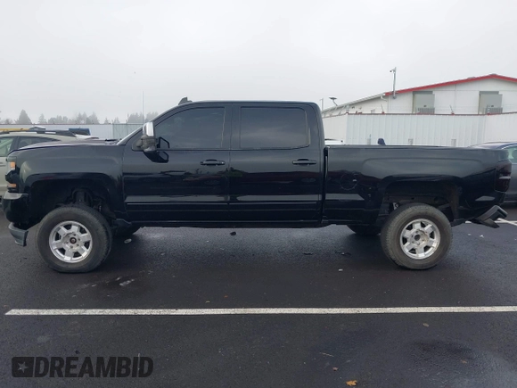 2017 Chevrolet Silverado 1500 LT with VIN 1GCUKREC1HF117744, listed as a IAAI auction lot 41091255 with 61,984 mi miles and . Bid and sale history available at DreamBid. Image 14.