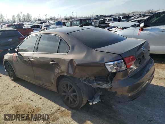 2015 Volkswagen Jetta SE with VIN 3VWD17AJ9FM283810, listed as a Copart auction lot 43255024 with 135,067 mi miles and Salvage title. Bid and sale history available at DreamBid. Image 2.