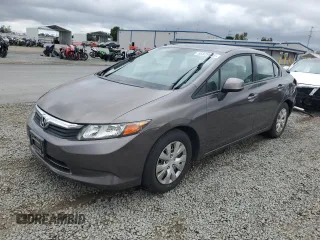 2012 Honda Civic LX z VIN 19XFB2F5XCE372945, wystawiony jako Copart lot #55329915 z przebiegiem 163 176 mil mil oraz Szkoda całkowita • Salvage title. Historia ofert i sprzedaży dostępna na DreamBid. Obrazek 1.