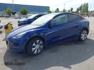 2020 Tesla Model Y Long Range with VIN 5YJYGDEE1LF006227, listed as a IAAI auction lot 42100833 with 49,761 mi miles and . Bid and sale history available at DreamBid. Image 2.