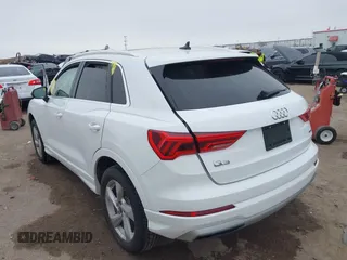 2021 Audi Q3 Premium with VIN WA1AUCF35M1089733, listed as a IAAI auction lot 41506186 with 69,211 mi miles and . Bid and sale history available at DreamBid. Image 3.