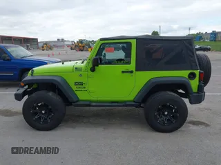 2013 Jeep Wrangler Sport with VIN 1C4AJWAG8DL507944, listed as a IAAI auction lot 42143144 with 70,085 mi miles and . Bid and sale history available at carsss.com. Image 14.