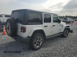 2019 Jeep Wrangler Unlimited Sahara с VIN 1C4HJXEG6KW580031, выставлен на аукционе Copart как лот 59687835 с пробегом 136 590 миль миль и Списание • Salvage title. История ставок и продаж доступна на DreamBid. Изображение 3.