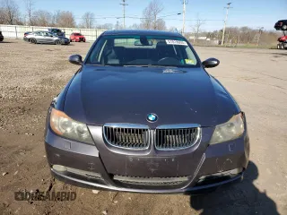 2007 BMW 3 Series 328xi with VIN WBAVC73557KP35114, listed as a Copart auction lot 51818055 with 225,165 mi miles and Salvage title. Bid and sale history available at DreamBid. Image 5.