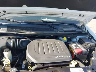 2015 Dodge Grand Caravan SE with VIN 2C4RDGBGXFR569435, listed as a IAAI auction lot 42057084 with 160,058 mi miles and . Bid and sale history available at DreamBid. Image 10.