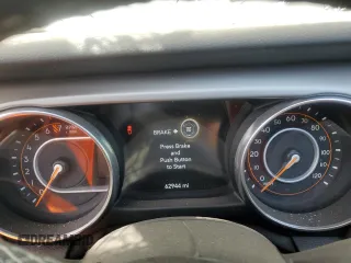 2023 Jeep Wrangler Sport S with VIN 1C4HJXDG0PW668162, listed as a Copart auction lot 45942865 with 62,944 mi miles and Salvage Title. Bid and sale history available at DreamBid. Image 9.