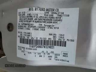 2007 Ford Focus S with VIN 1FAFP34N07W324821, listed as a Copart auction lot 51103105 with 134,417 mi miles and Salvage Title. Bid and sale history available at carsss.com. Image 12.