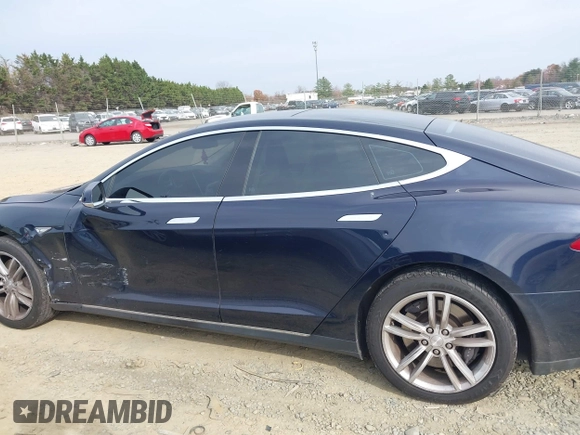 2014 Tesla Model S 60 with VIN 5YJSA1S12EFP42605, listed as a IAAI auction lot 40905031 with 68,155 mi miles and . Bid and sale history available at DreamBid. Image 14.