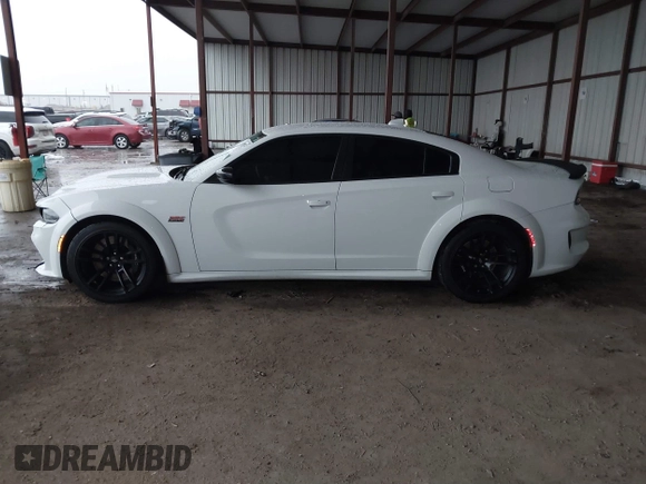 2023 Dodge Charger Scat Pack Widebody with VIN 2C3CDXGJ9PH516473, listed as a IAAI auction lot 41188167 with 38,021 mi miles and . Bid and sale history available at DreamBid. Image 14.