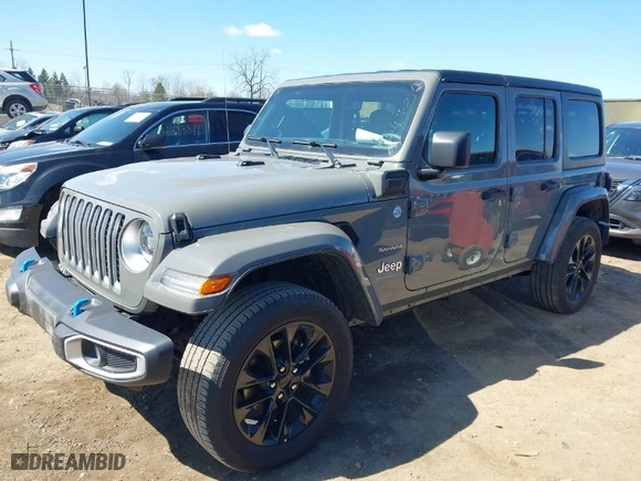 2023 Jeep Wrangler 4xe Sahara with VIN 1C4JJXP62PW696002, listed as a IAAI auction lot 41891127 with 44,567 mi miles. Bid and sale history available at carsss.com. Image 2.