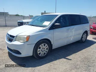 2014 Dodge Grand Caravan American Value with VIN 2C4RDGBG5ER187005, listed as a IAAI auction lot 42018333 with 216,149 mi miles and . Bid and sale history available at DreamBid. Image 17.