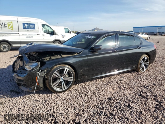2018 BMW 7 Series 750i with VIN WBA7F0C57JGM23040, listed as a Copart auction lot 87392704 with 0 mi miles and Salvage Title. Bid and sale history available at carsss.com. Image 1.
