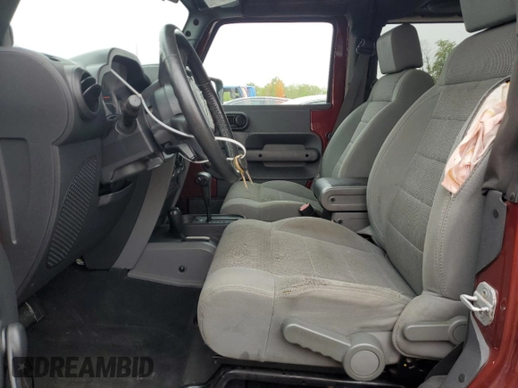 2007 Jeep Wrangler Rubicon с VIN 1J8GA64137L149019, выставлен на аукционе Copart как лот 56499575 с пробегом 146 230 миль миль и Списание • Salvage title. История ставок и продаж доступна на DreamBid. Изображение 7.