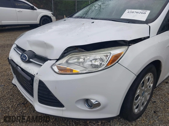 2012 Ford Focus SE with VIN 1FAHP3F21CL201889, listed as a IAAI auction lot 42070260 with 126,650 mi miles. Bid and sale history available at carsss.com. Image 17.