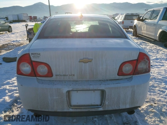 2012 Chevrolet Malibu LTZ with VIN 1G1ZG5E73CF270839, listed as a IAAI auction lot 41284490 with 133,423 mi miles and . Bid and sale history available at DreamBid. Image 16.