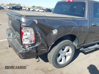2015 Ram 1500 Tradesman with VIN 1C6RR7KG1FS769305, listed as a IAAI auction lot 41337285 with 97,052 mi miles and . Bid and sale history available at DreamBid. Image 6.