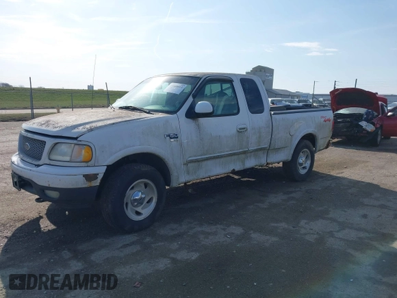 1999 Ford F-150 XL with VIN 2FTRX18L7XCA69231, listed as a IAAI auction lot 41880011 with 1 mi miles. Bid and sale history available at carsss.com. Image 2.